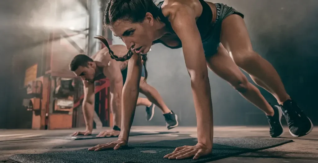 a group of people doing push ups